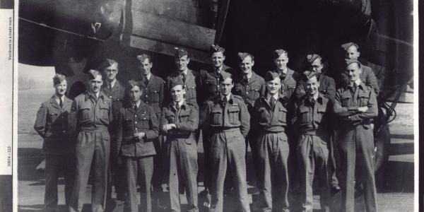 Group Captain Leonard Cheshire stood with group