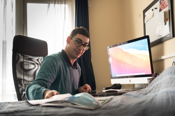 Jonathan busy working in his home at Eden Square