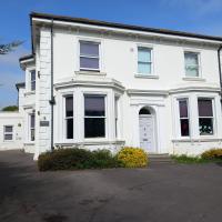 Exterior view of white detached Fethneys care home 